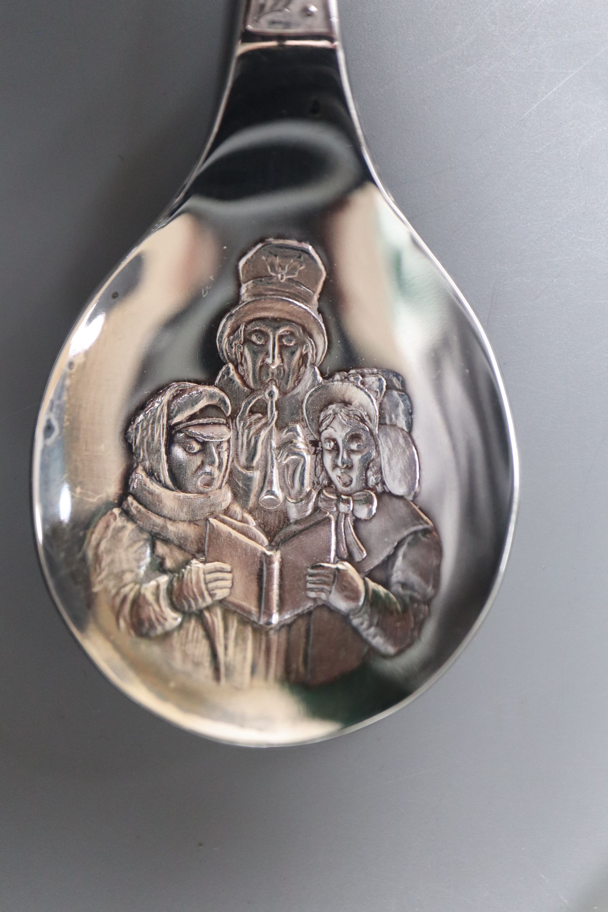A cased set of six silver teaspoons and two single Christmas spoons